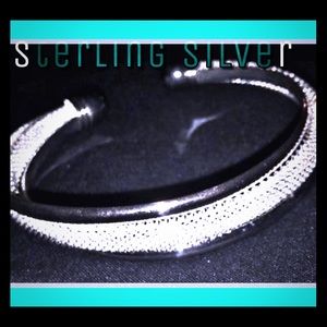 A sterling silver woman’s Bangle